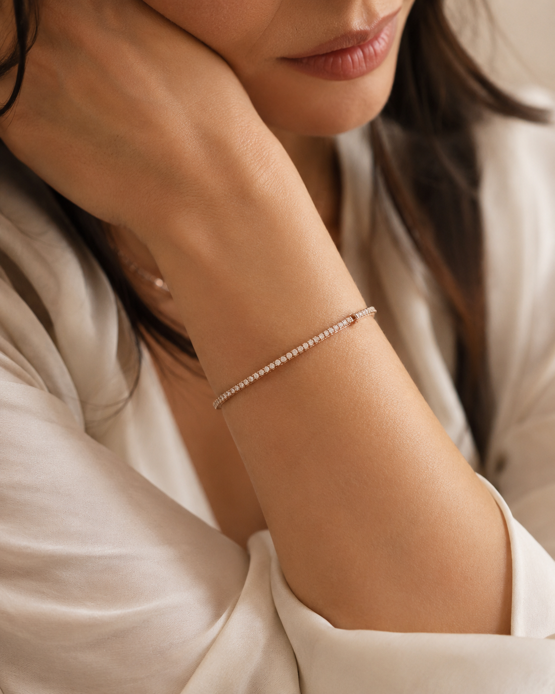Rose gold diamond bracelet worn on wrist