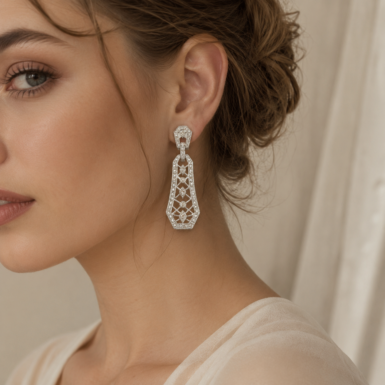 Custom diamond drop earrings worn on model