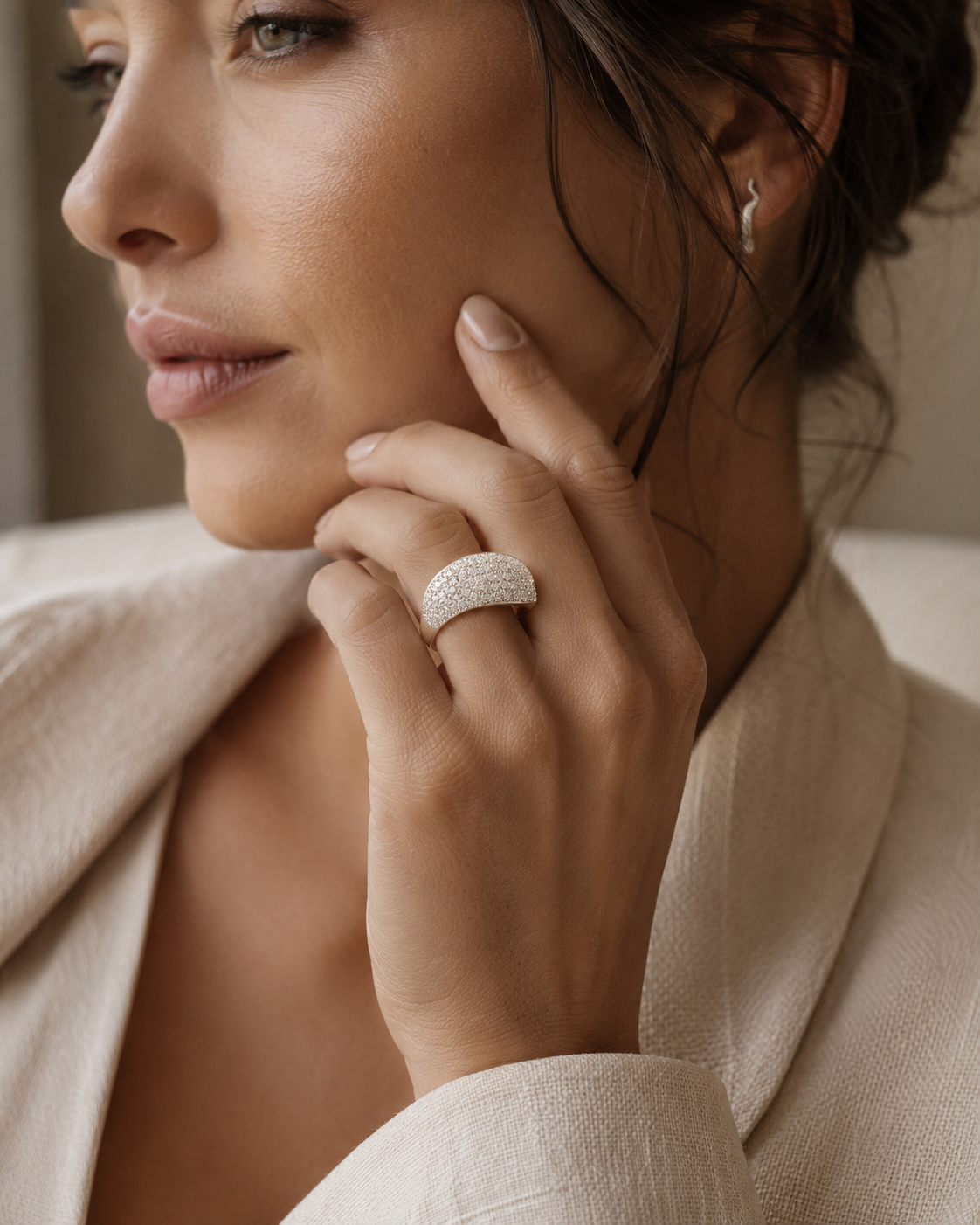 Pavé diamond dome ring worn on hand